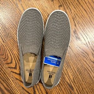 Grey slip on sneakers